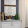 Modern apartment design at The Morgan in Chapel Hill, highlighting stainless steel appliances, granite countertops, and hardwood-style flooring.