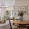 Interior of a model apartment at The Morgan, Chapel Hill, with stainless steel kitchen appliances, granite countertops, and contemporary furnishings